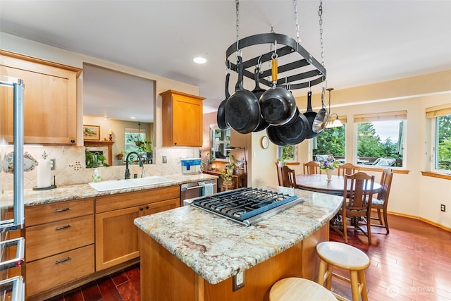 34059 Bridge View Dr NE, Kingston, WA 98346 - kitchen featuring gas stovetop, dark wood finished floors, a kitchen island, backsplash, and recessed lighting