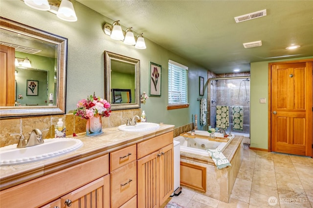 34059 Bridge View Dr NE, Kingston, WA 98346 - bathroom with a shower stall, a tub with jets, double vanity, and tile patterned floors