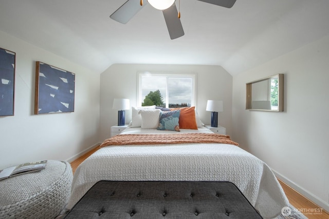7310 10th Ave NW, Seattle, WA 98117 - bedroom featuring wood finished floors, lofted ceiling, and a ceiling fan