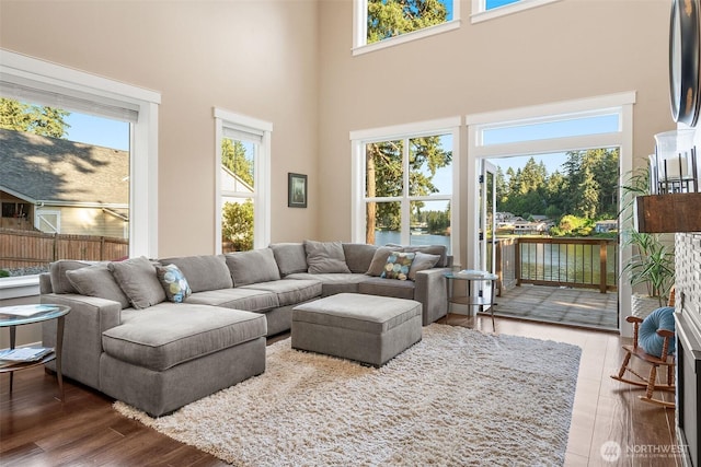 7235 20th Ave SE Unit A & B, Lacey, WA 98503 - living area with a high ceiling, wood finished floors, and a water view