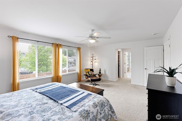 1897 Claret Loop NW, Poulsbo, WA 98370 - bedroom featuring light carpet and a ceiling fan