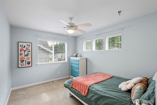 1897 Claret Loop NW, Poulsbo, WA 98370 - bedroom with light colored carpet and ceiling fan
