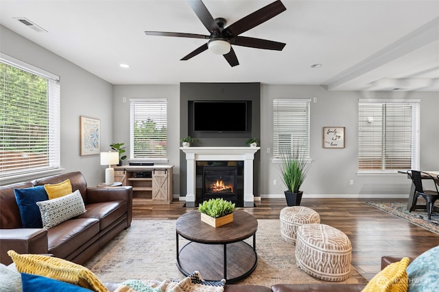 1897 Claret Loop NW, Poulsbo, WA 98370 - living area with wood finished floors, ceiling fan, a fireplace with flush hearth, and recessed lighting