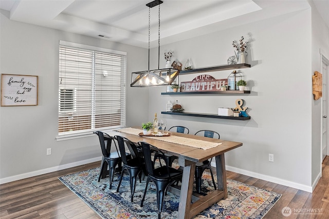 1897 Claret Loop NW, Poulsbo, WA 98370 - dining room featuring a tray ceiling, wood finished floors, and a chandelier