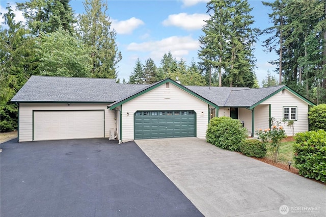 11411 208th Ave E, Bonney Lake, WA 98391 - single story home with asphalt driveway, an attached garage, and a shingled roof