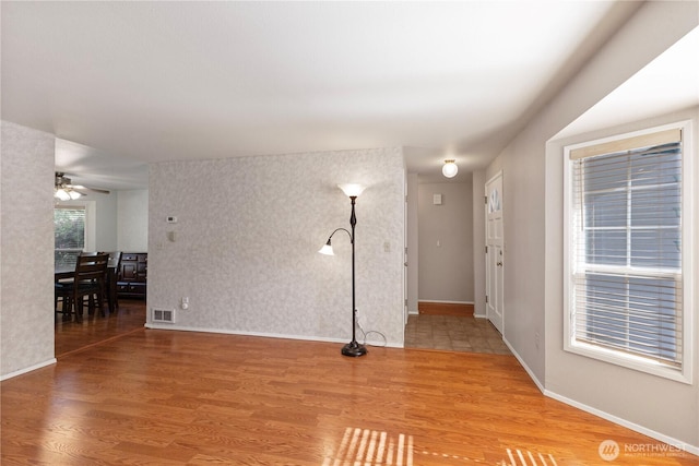 11411 208th Ave E, Bonney Lake, WA 98391 - empty room featuring wood finished floors and a ceiling fan