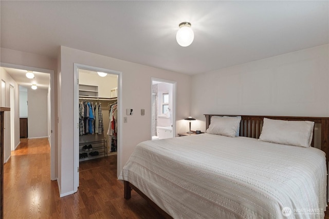11411 208th Ave E, Bonney Lake, WA 98391 - bedroom featuring a spacious closet, wood finished floors, a closet, and ensuite bathroom