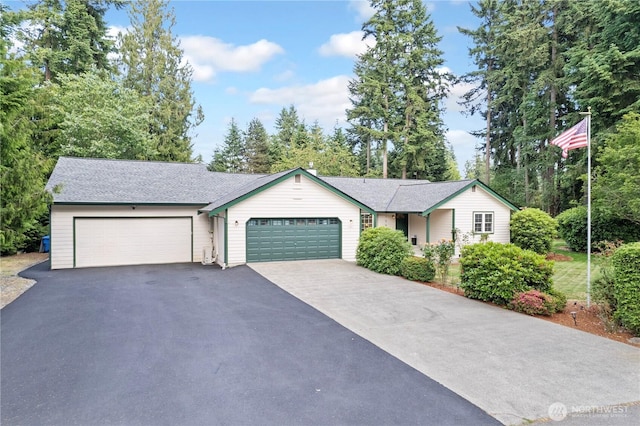 11411 208th Ave E, Bonney Lake, WA 98391 - ranch-style home featuring asphalt driveway, an attached garage, and a shingled roof