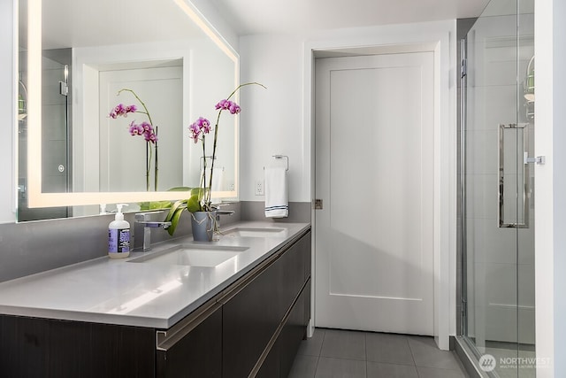 1808 Minor Ave Unit 3005, Seattle, WA 98101 - full bathroom with tile patterned flooring, double vanity, and a shower with shower door