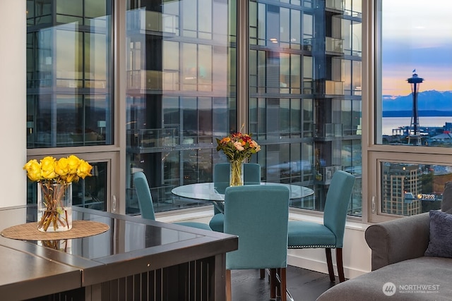 1808 Minor Ave Unit 3005, Seattle, WA 98101 - dining room featuring wood finished floors and a water view