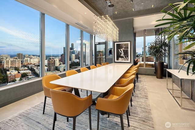 1808 Minor Ave Unit 3005, Seattle, WA 98101 - dining room featuring a chandelier and a city view