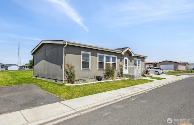 1701 E Burr Ave Unit 67, Moses Lake, WA 98837 - manufactured / mobile home with crawl space and a front lawn