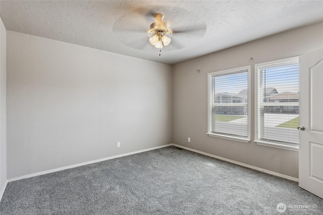 1701 E Burr Ave Unit 67, Moses Lake, WA 98837 - carpeted empty room featuring ceiling fan and a textured ceiling