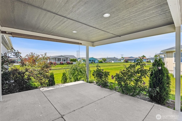 1701 E Burr Ave Unit 67, Moses Lake, WA 98837 - view of patio featuring a residential view