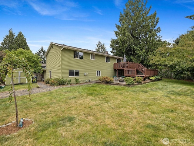 2613 172nd Pl SE, Bothell, WA 98012 - back of house featuring a shed, a wooden deck, and a lawn