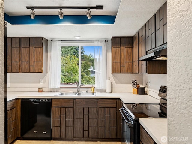2613 172nd Pl SE, Bothell, WA 98012 - kitchen with dishwasher, electric range oven, under cabinet range hood, track lighting, and light countertops