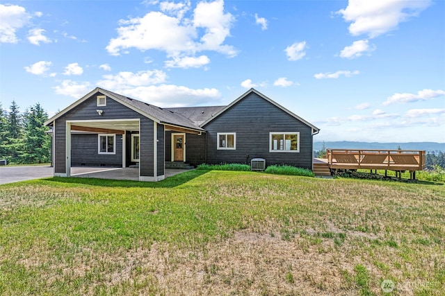 874 W State Route 4, Cathlamet, WA 98612 - back of property with a yard, a deck, and a patio