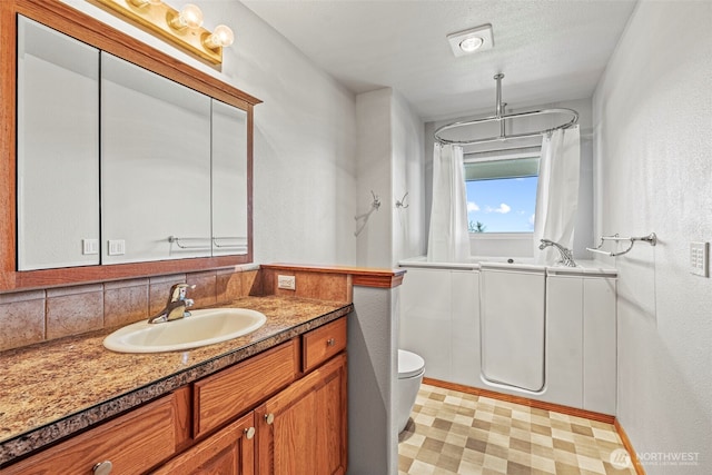 874 W State Route 4, Cathlamet, WA 98612 - full bathroom with a bath, tile patterned floors, vanity, curtained shower, and a textured wall
