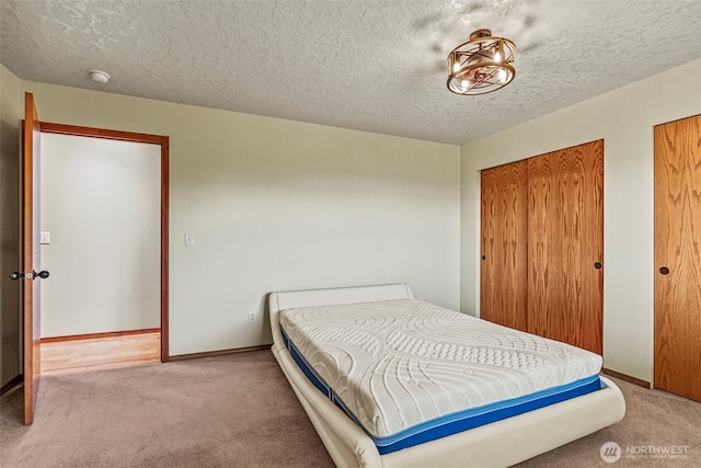 874 W State Route 4, Cathlamet, WA 98612 - bedroom with carpet floors and a textured ceiling