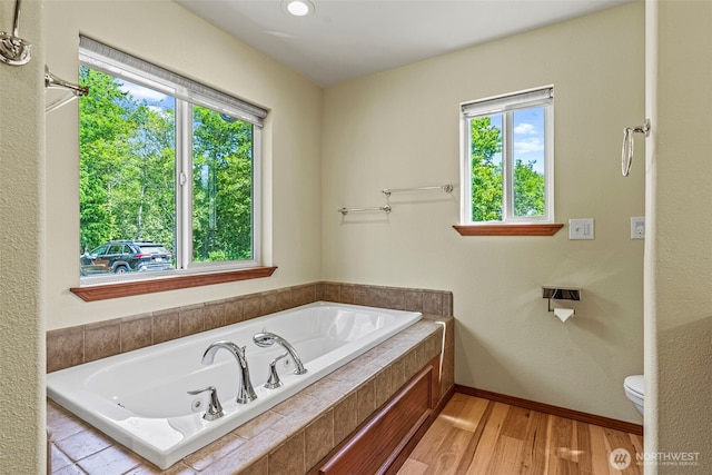 874 W State Route 4, Cathlamet, WA 98612 - bathroom with plenty of natural light, a garden tub, and wood finished floors