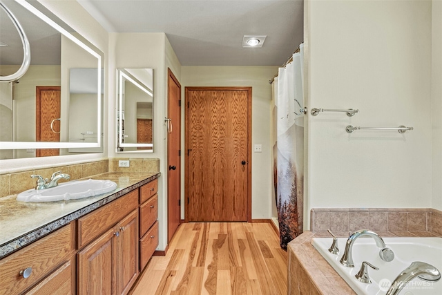 874 W State Route 4, Cathlamet, WA 98612 - bathroom featuring vanity, wood finished floors, and a bath