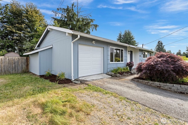 12629 SE 169th St, Renton, WA 98058 - view of front of property with a garage and asphalt driveway