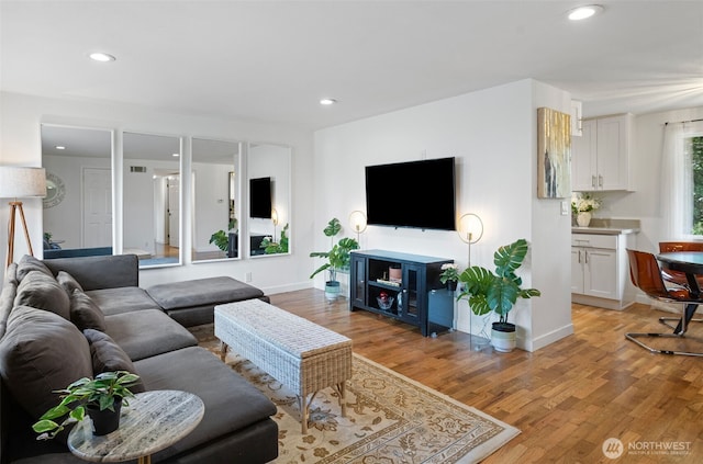 12629 SE 169th St, Renton, WA 98058 - living room featuring light wood finished floors and recessed lighting