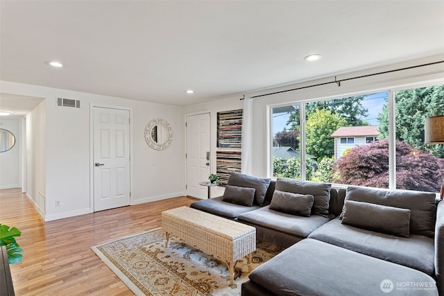 12629 SE 169th St, Renton, WA 98058 - living room featuring light wood-style flooring and recessed lighting