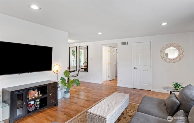 12629 SE 169th St, Renton, WA 98058 - living area with light wood finished floors and recessed lighting