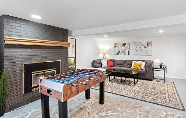 12629 SE 169th St, Renton, WA 98058 - rec room with a brick fireplace and recessed lighting