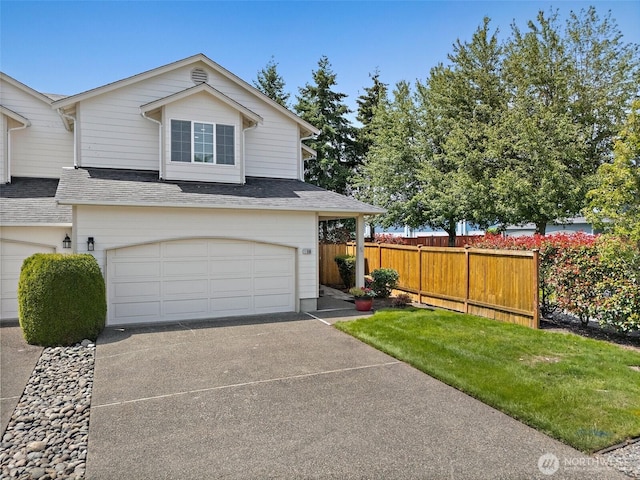 11008 36th Ave Court E, Tacoma, WA 98446 - view of front of home with an attached garage, driveway, and a shingled roof