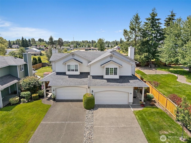 11008 36th Ave Court E, Tacoma, WA 98446 - traditional-style house featuring a shingled roof, a chimney, driveway, a garage, and stairs