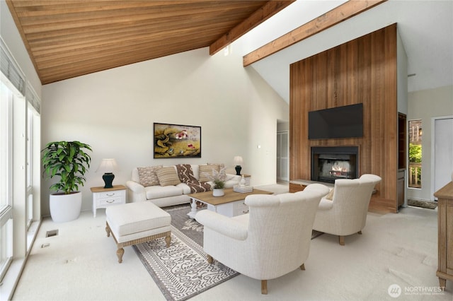 2838 170th Ave SE, Bellevue, WA 98008 - living room with light colored carpet, a fireplace, plenty of natural light, high vaulted ceiling, and beamed ceiling