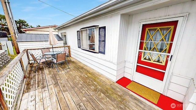 11453 Bayview Edison Rd Unit 25, Mount Vernon, WA 98273 - wooden terrace with outdoor dining area