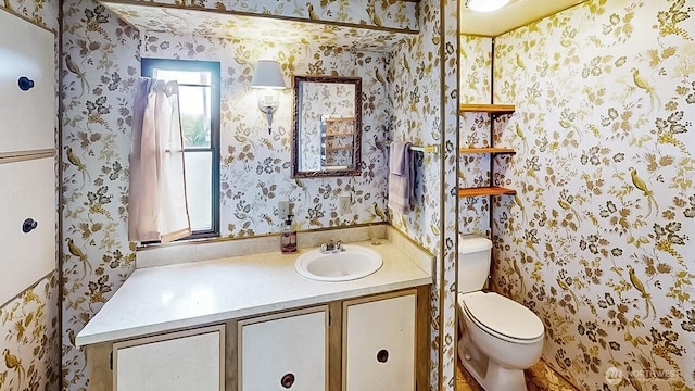 11453 Bayview Edison Rd Unit 25, Mount Vernon, WA 98273 - bathroom with wallpapered walls and vanity