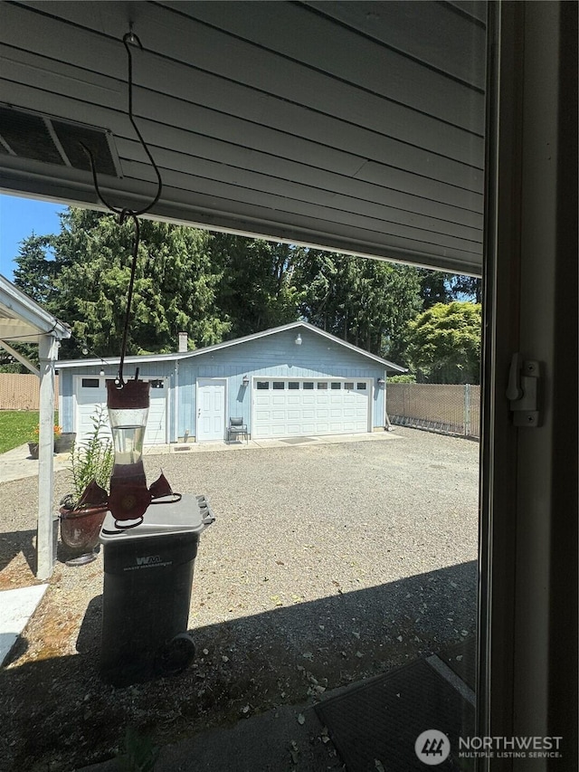 8329 20th St SE, Lake Stevens, WA 98258 - detached garage with view of wooded area
