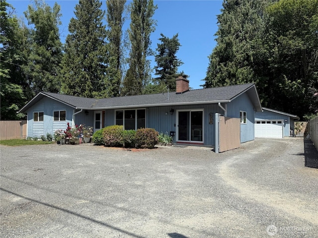 8329 20th St SE, Lake Stevens, WA 98258 - ranch-style house with a chimney, driveway, and a garage