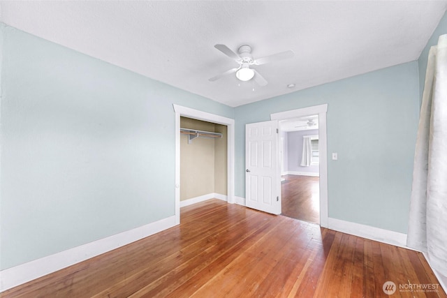2304 F St, Bellingham, WA 98225 - unfurnished bedroom with a closet, wood finished floors, and ceiling fan