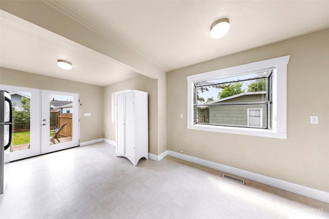 2304 F St, Bellingham, WA 98225 - empty room featuring french doors and light floors