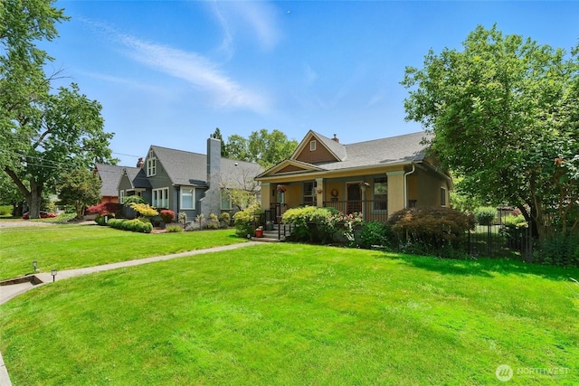 634 University St, Walla Walla, WA 99362 - view of front of property with a porch and a front yard