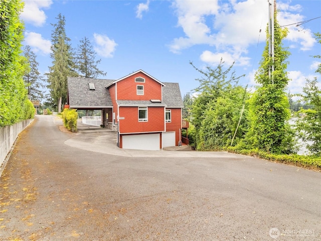 2519 Carpenter Rd, Lacey, WA 98503 - view of front of property with driveway, roof with shingles, and a garage