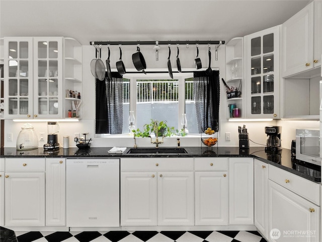 2519 Carpenter Rd, Lacey, WA 98503 - kitchen featuring white dishwasher, open shelves, white cabinetry, glass insert cabinets, and tile patterned floors