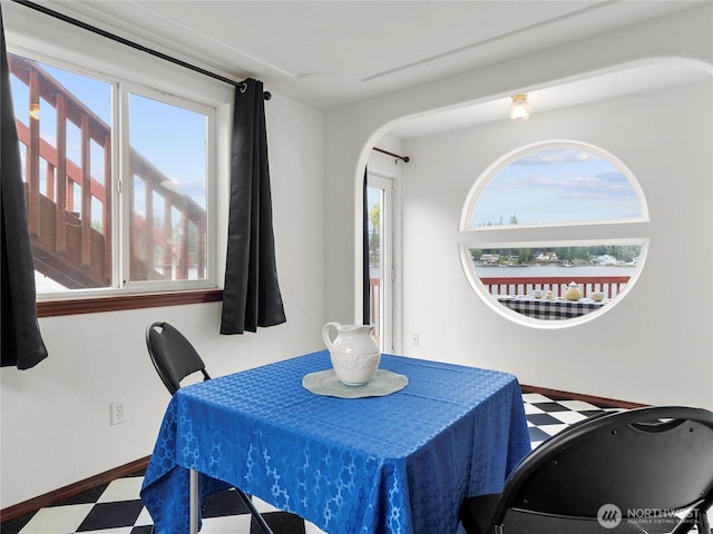 2519 Carpenter Rd, Lacey, WA 98503 - dining space with arched walkways and tile patterned floors