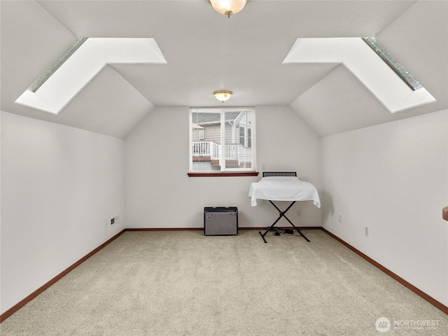 2519 Carpenter Rd, Lacey, WA 98503 - additional living space featuring a skylight, carpet floors, and vaulted ceiling