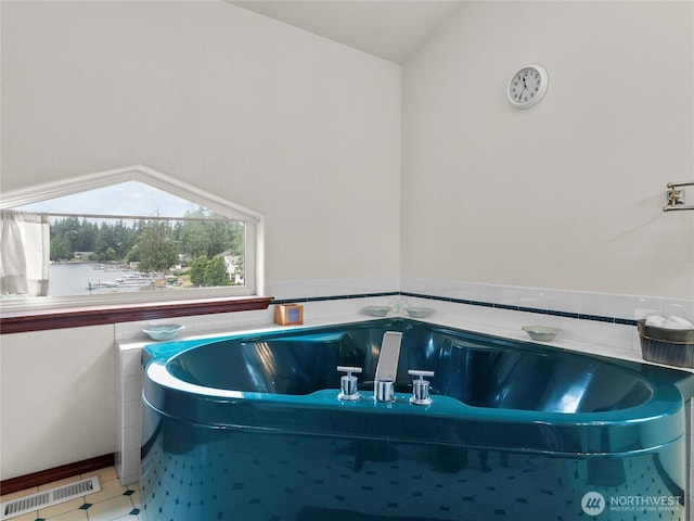 2519 Carpenter Rd, Lacey, WA 98503 - bathroom with a garden tub and lofted ceiling