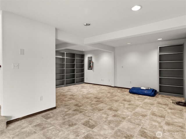 2519 Carpenter Rd, Lacey, WA 98503 - finished basement featuring built in shelves, electric panel, and recessed lighting