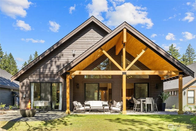81 Plateau Loop, Cle Elum, WA 98922 - back of house featuring an outdoor living space, a patio, and a yard