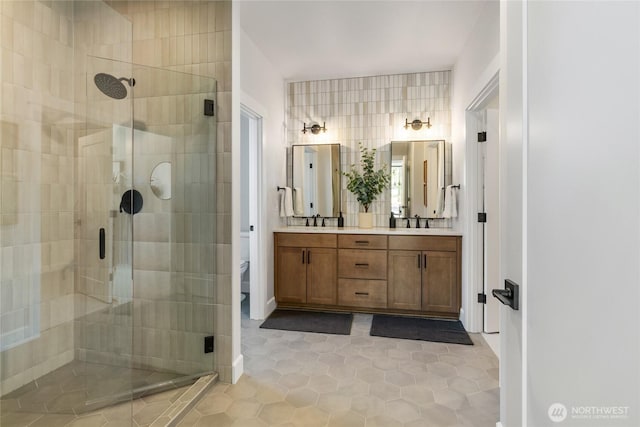 81 Plateau Loop, Cle Elum, WA 98922 - full bathroom with a shower stall, double vanity, and tile patterned floors