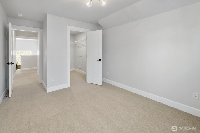 81 Plateau Loop, Cle Elum, WA 98922 - unfurnished bedroom featuring light carpet, a spacious closet, and a closet