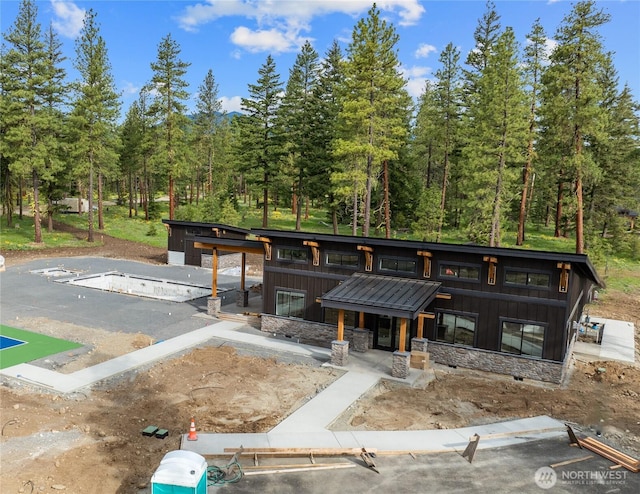 81 Plateau Loop, Cle Elum, WA 98922 - modern home with board and batten siding and stone siding